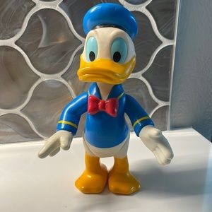 Donald Duck by Disney. Posable vintage figurine. Hard plastic. Good condition.